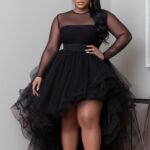 Robe asymétrique noire en tulle avec manches transparen
